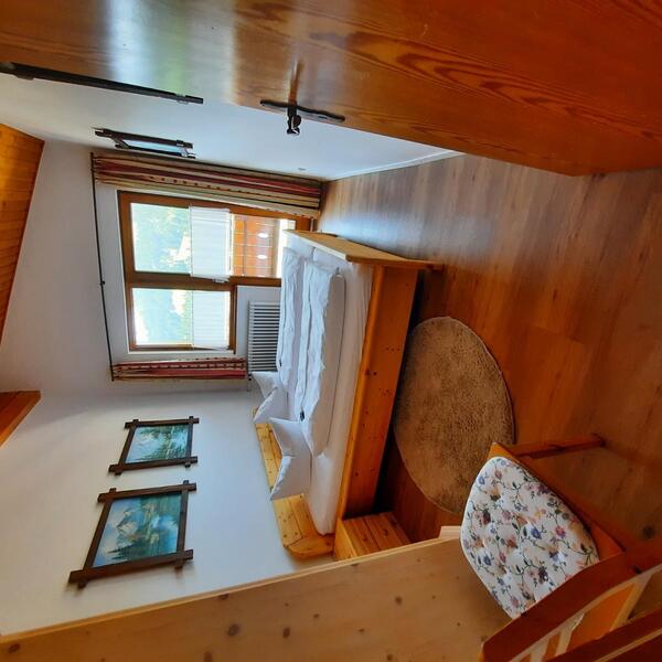 Schlafzimmer in der Familiensuite "Bergblick"