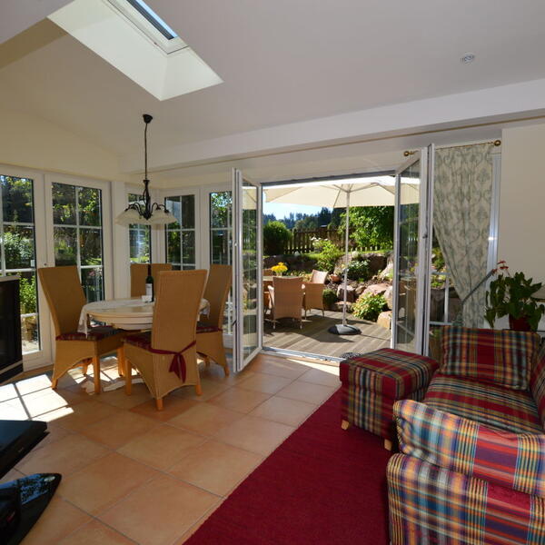 Ferienwohnung Rosengarten im Ferienhaus Carola