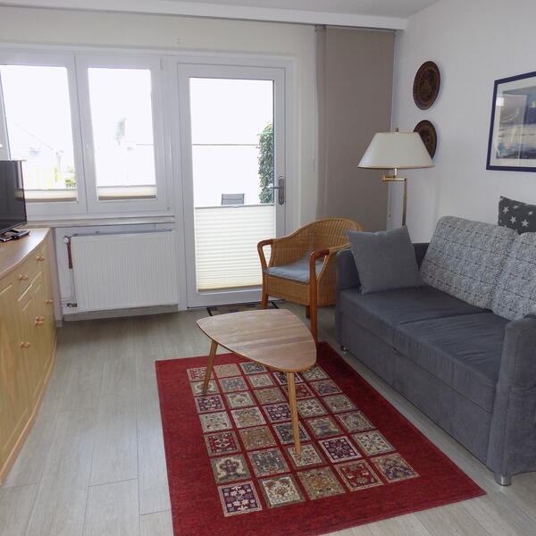 Wohnzimmer mit Schlafsofa