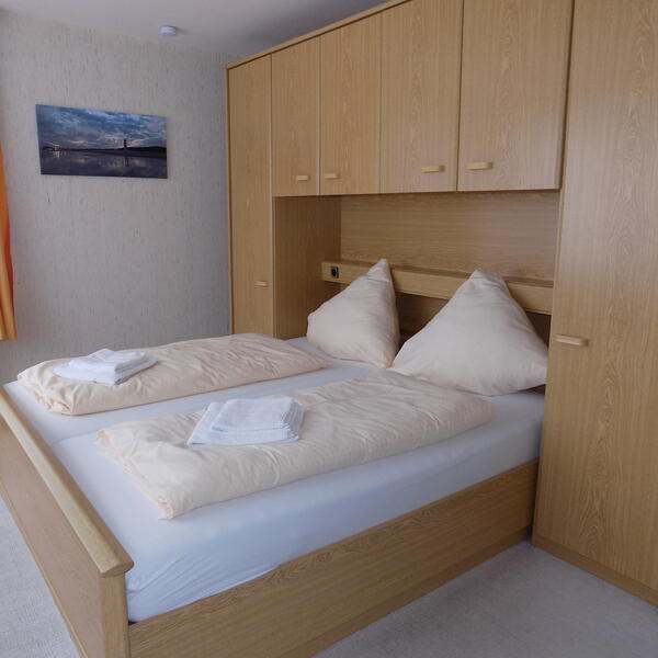 Schlafzimmer mit Balkon