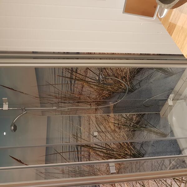 Dusche mit Strandblick